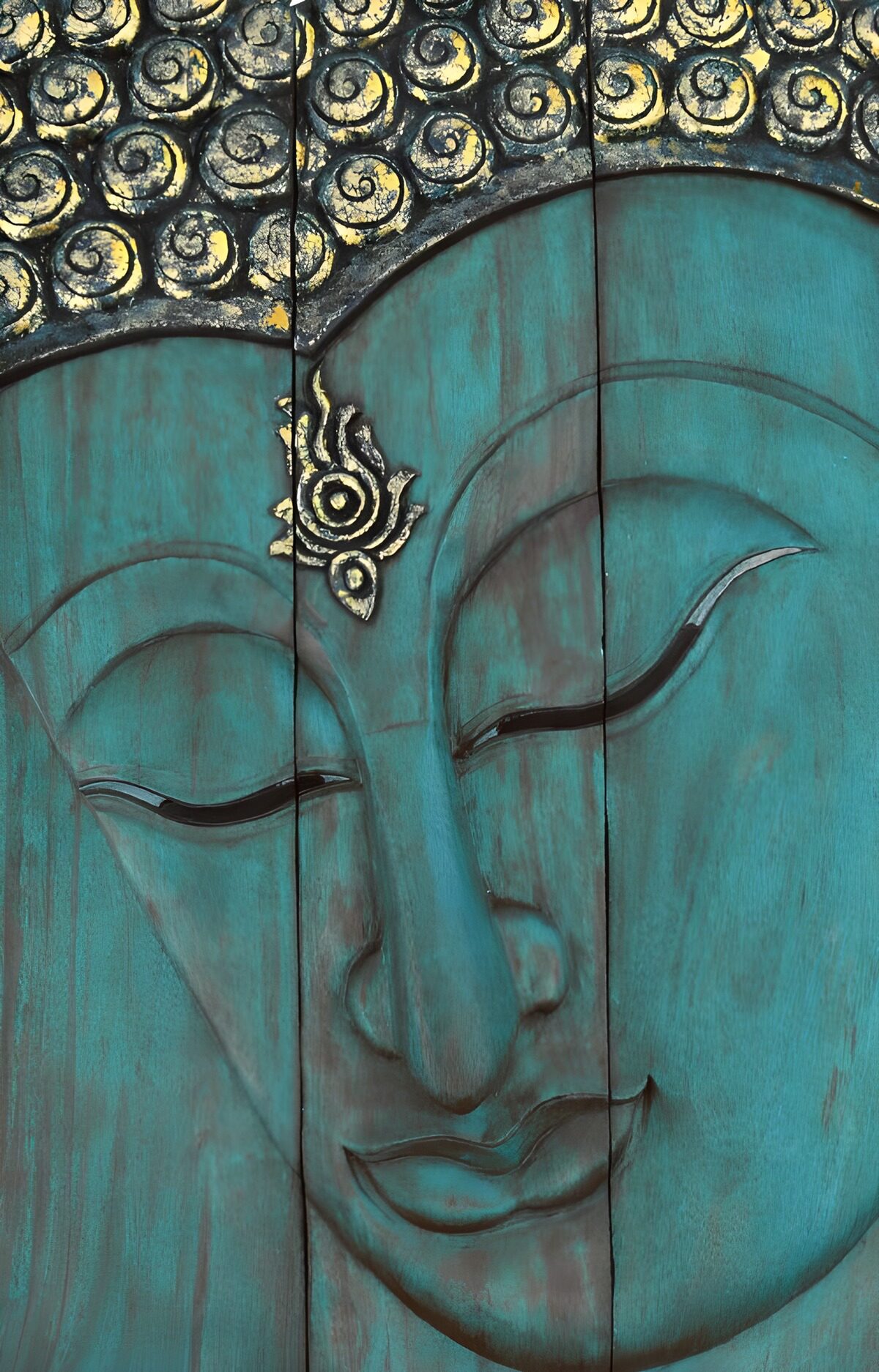 Visage de Bouddha en bois sculpté